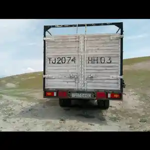 Бортовой грузовик