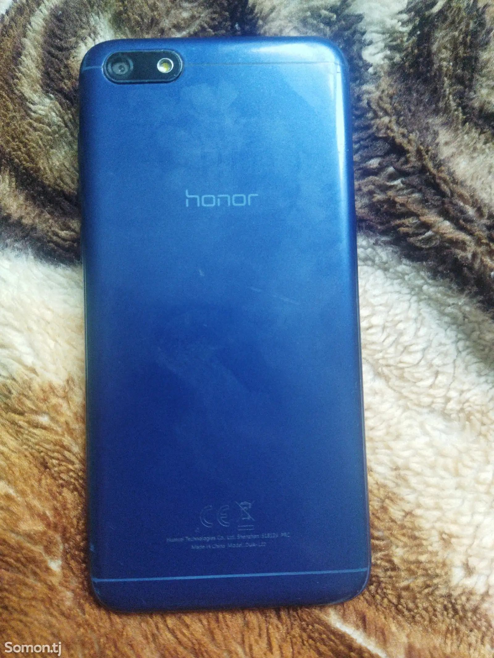 Телефон Honor-1