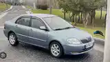 Бампер передний от Toyota Corolla 2002--2