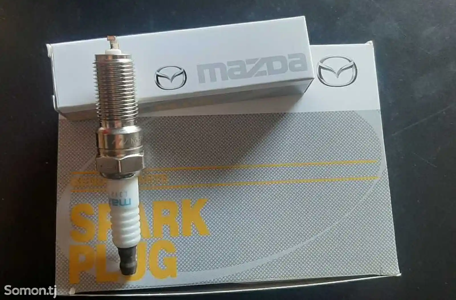 Свеча зажигания от Mazda-1