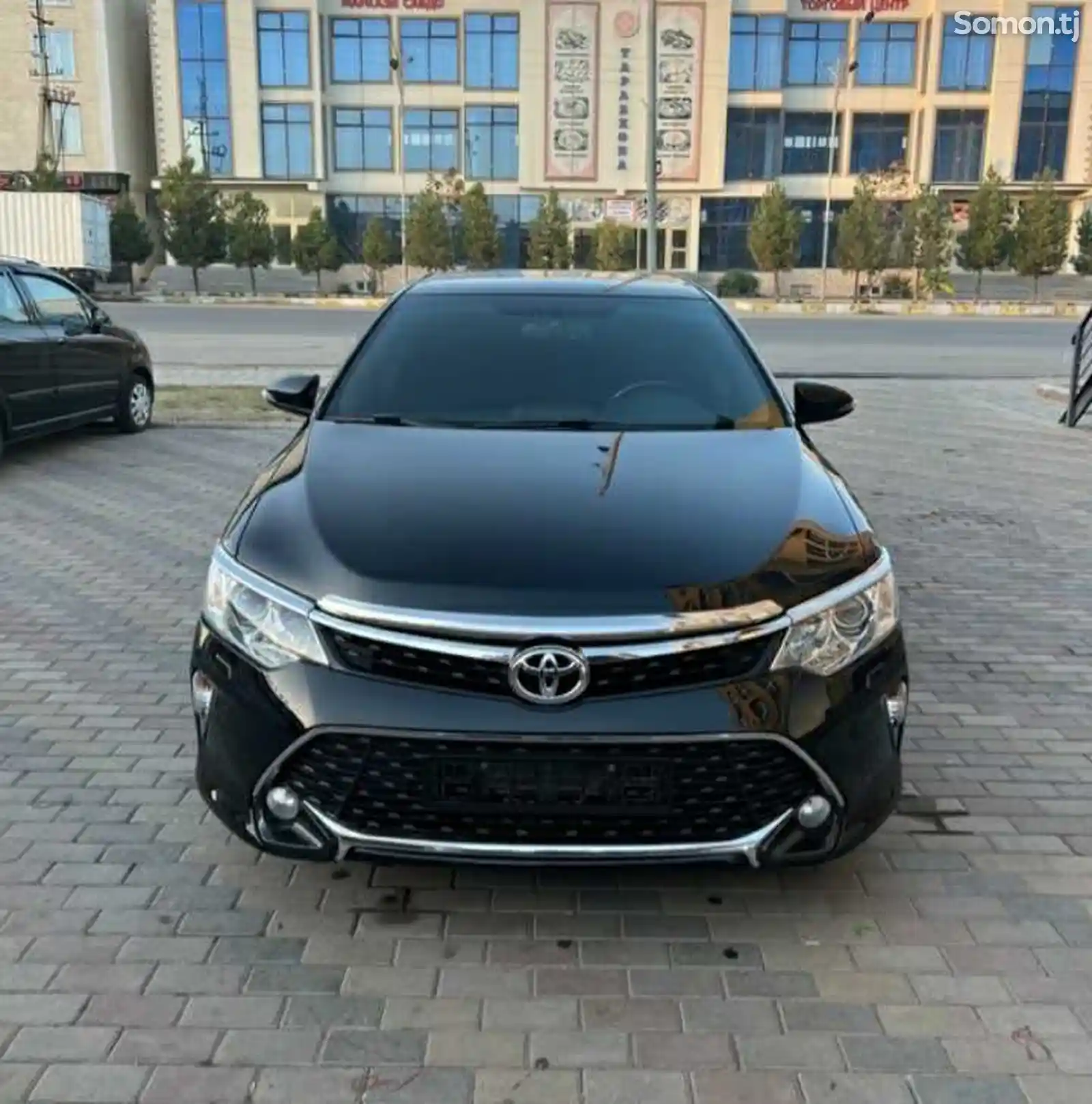 Задний бампер на Toyota Camry 5-3