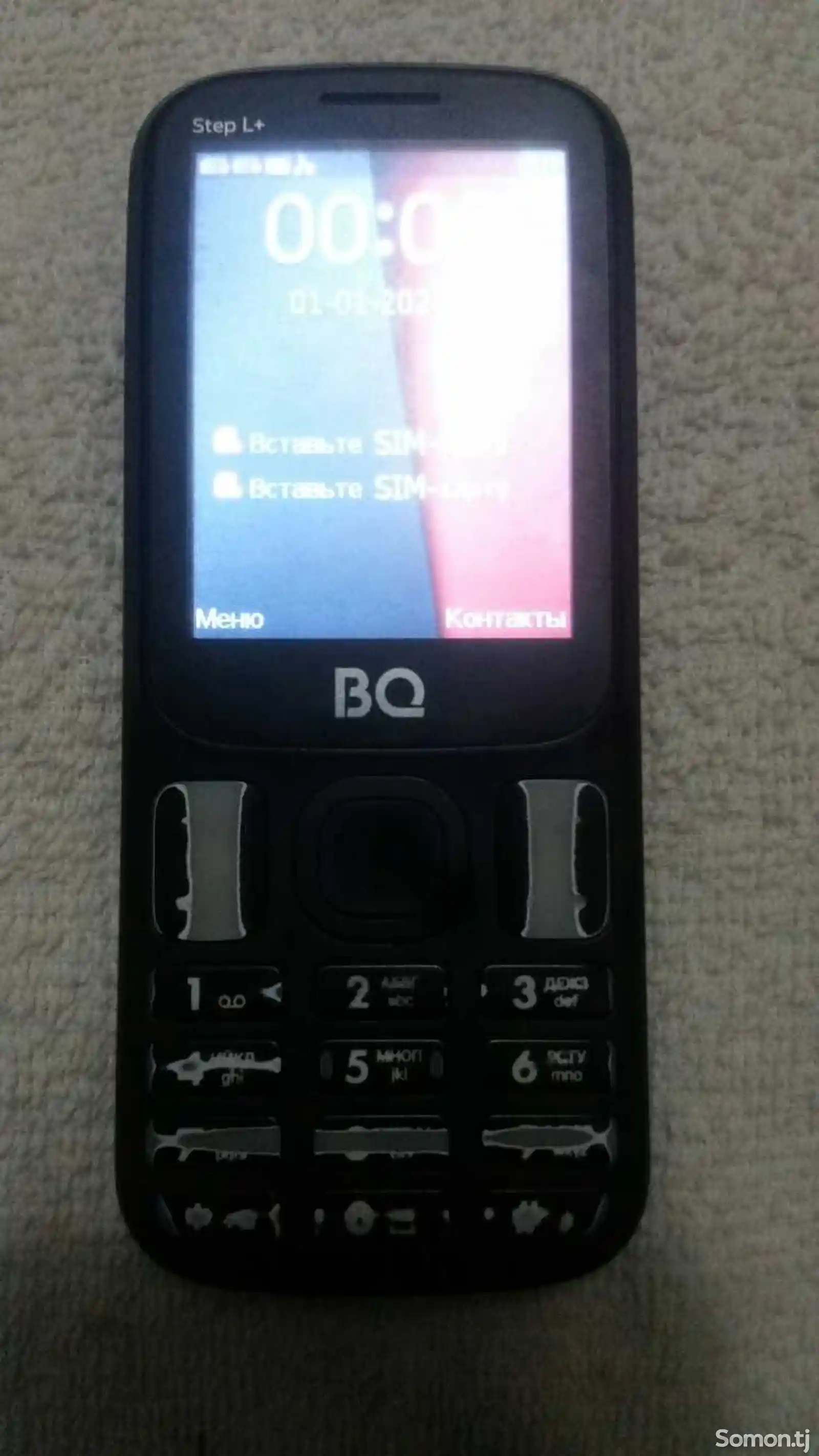 Tелефон BQ-1