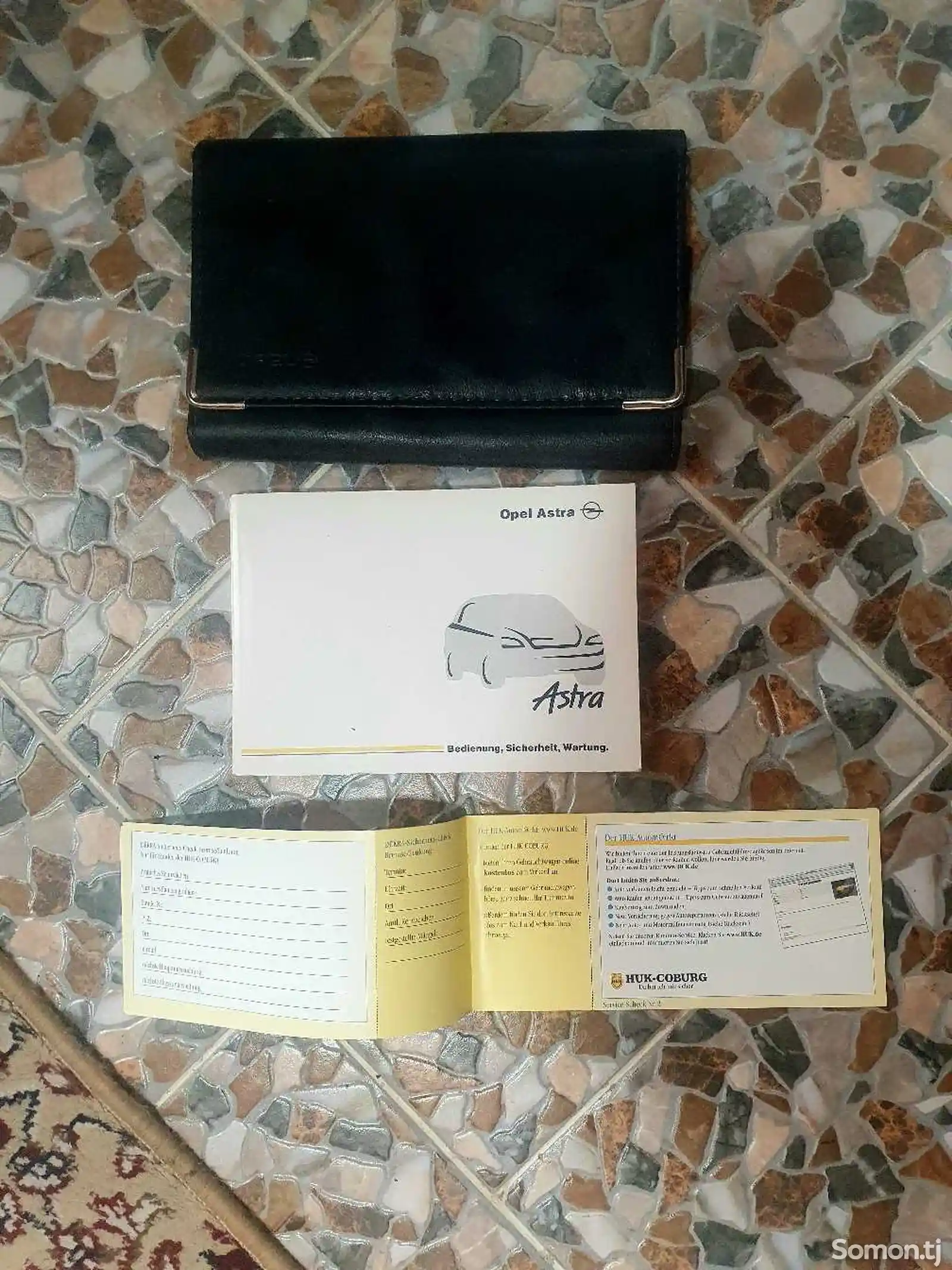 Книжка с чехлом от Opel Astra-2