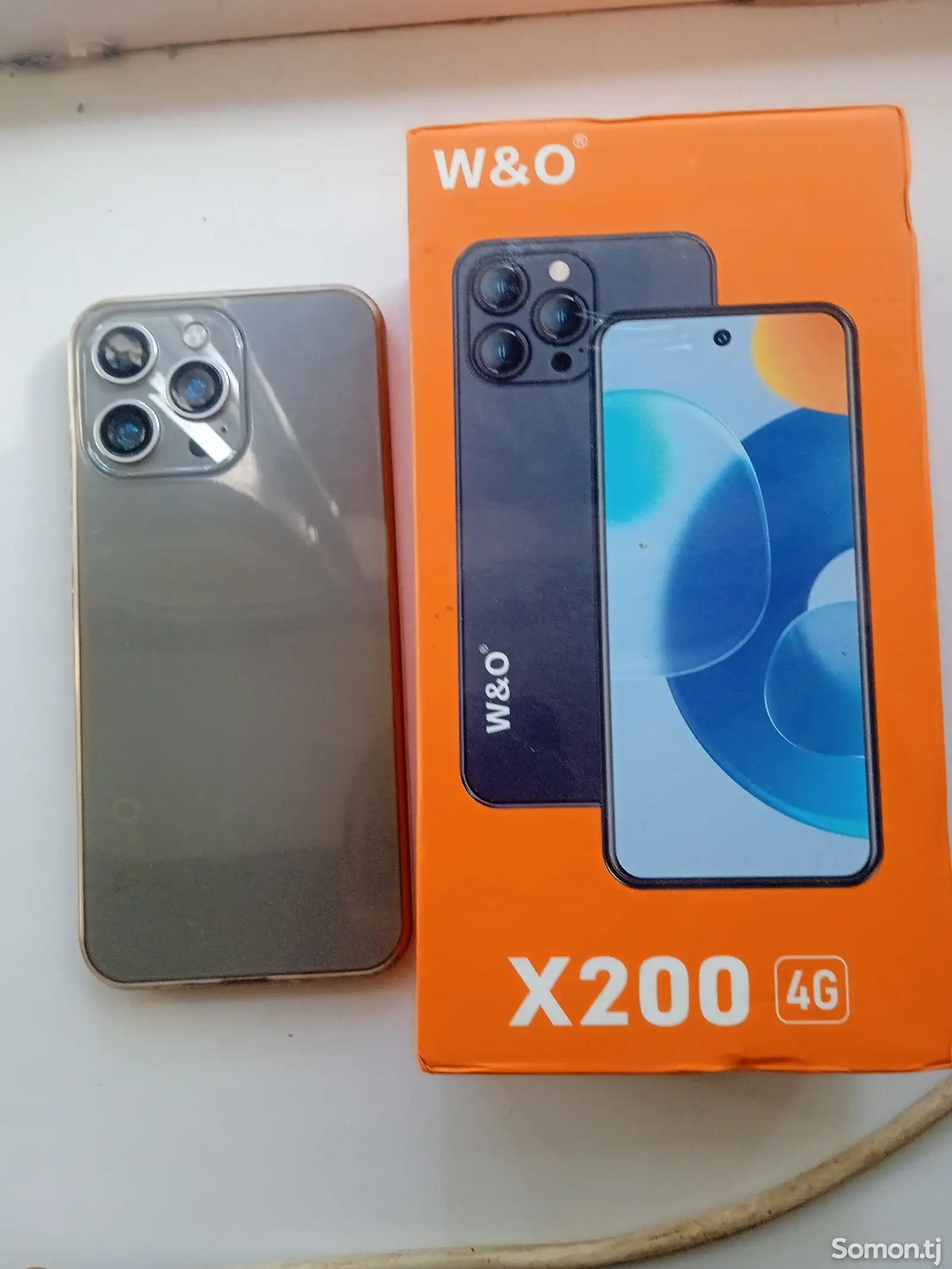 Телефон W and O X200-1