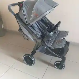 Детская коляска для двойняшек