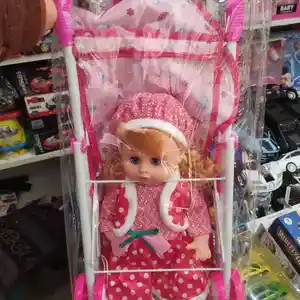 Детская коляска с куклой