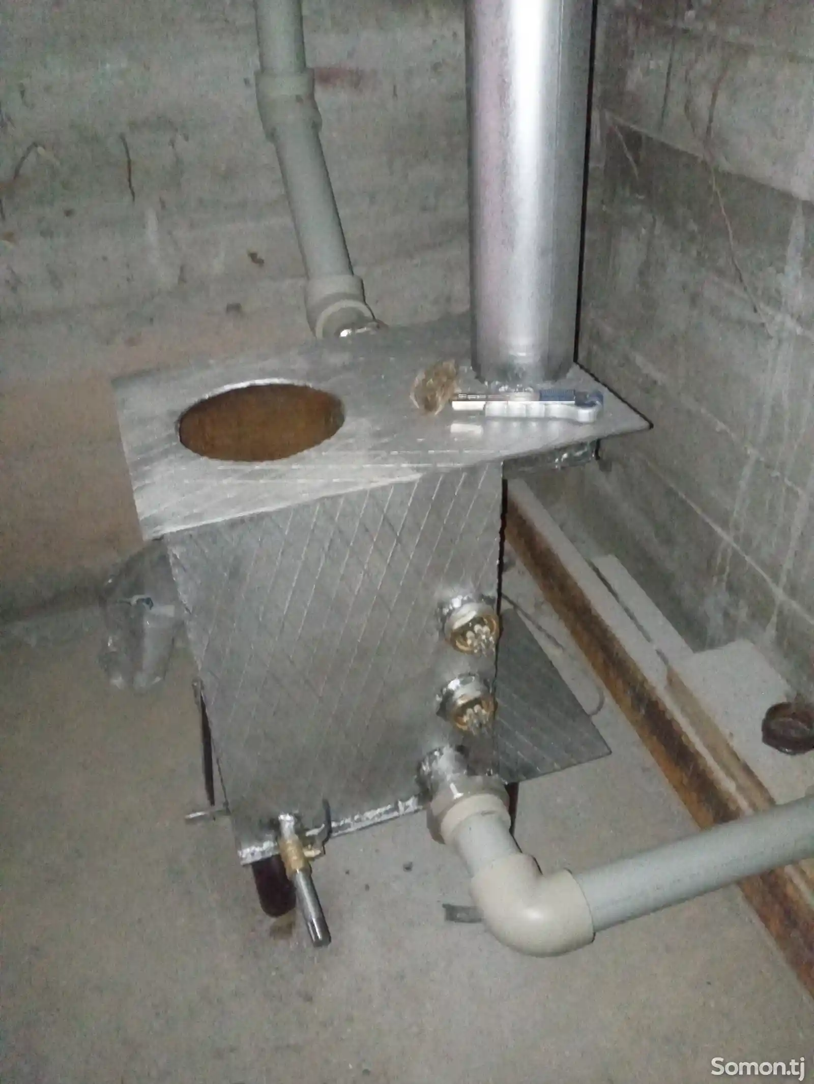 Монтаж системы самотечного отопления с комбинированным котлом-1