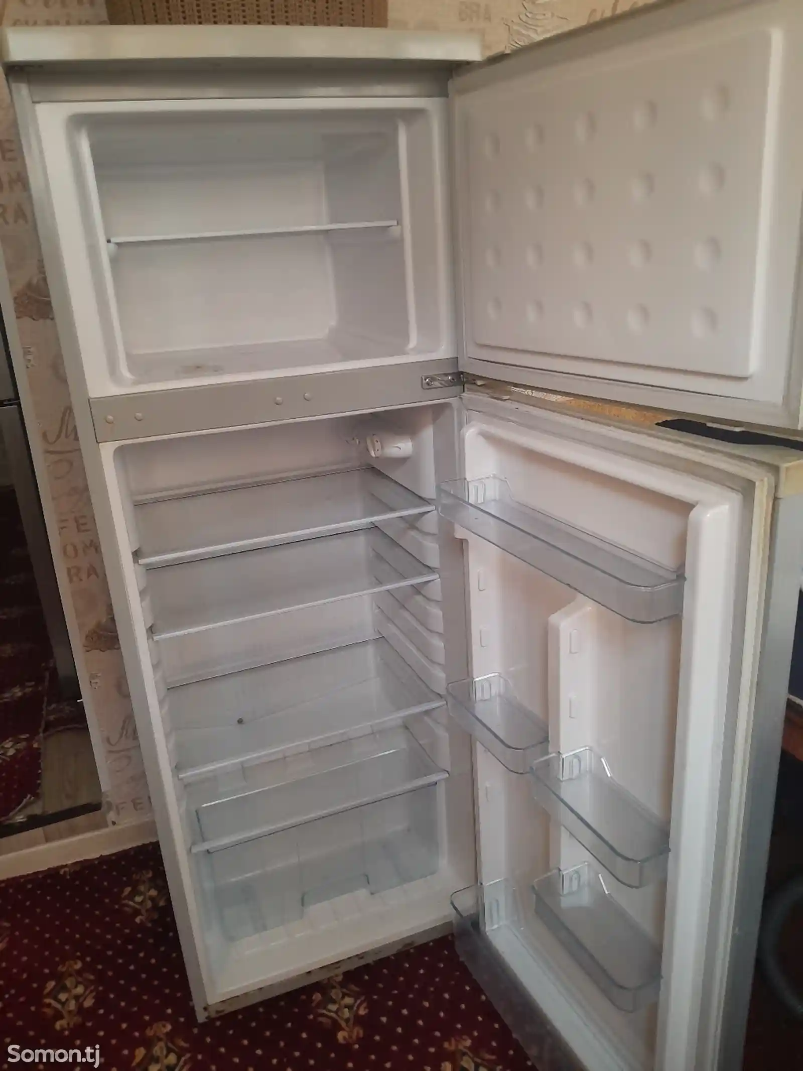 Холодильник Tomico-5