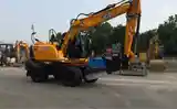 Колёсный экскаватор JCB 145W-8