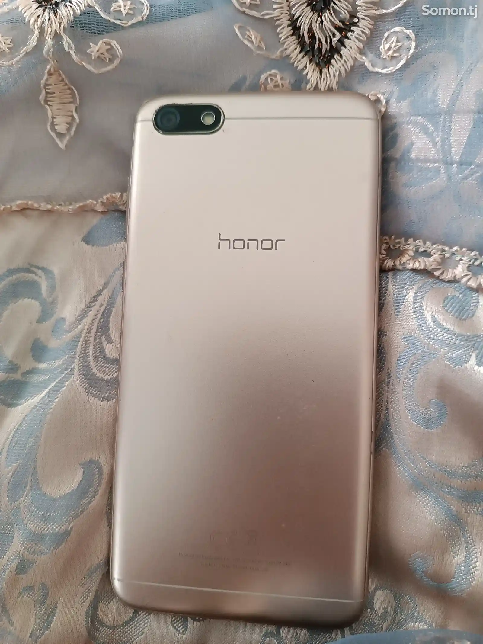 Телефон Honor-1