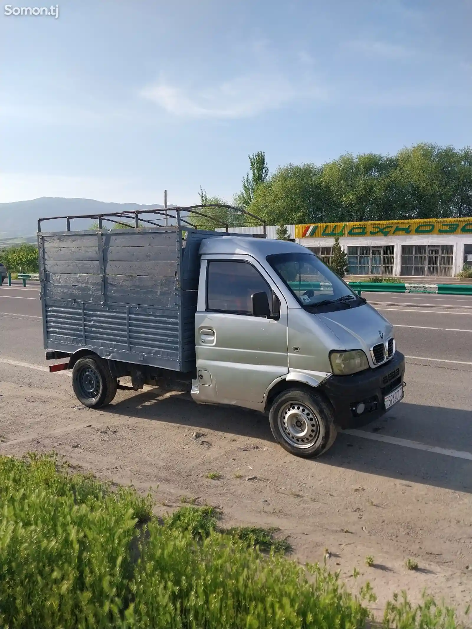 Бортовой автомобиль Танген-4