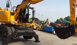 Колёсный экскаватор JCB 145W-11