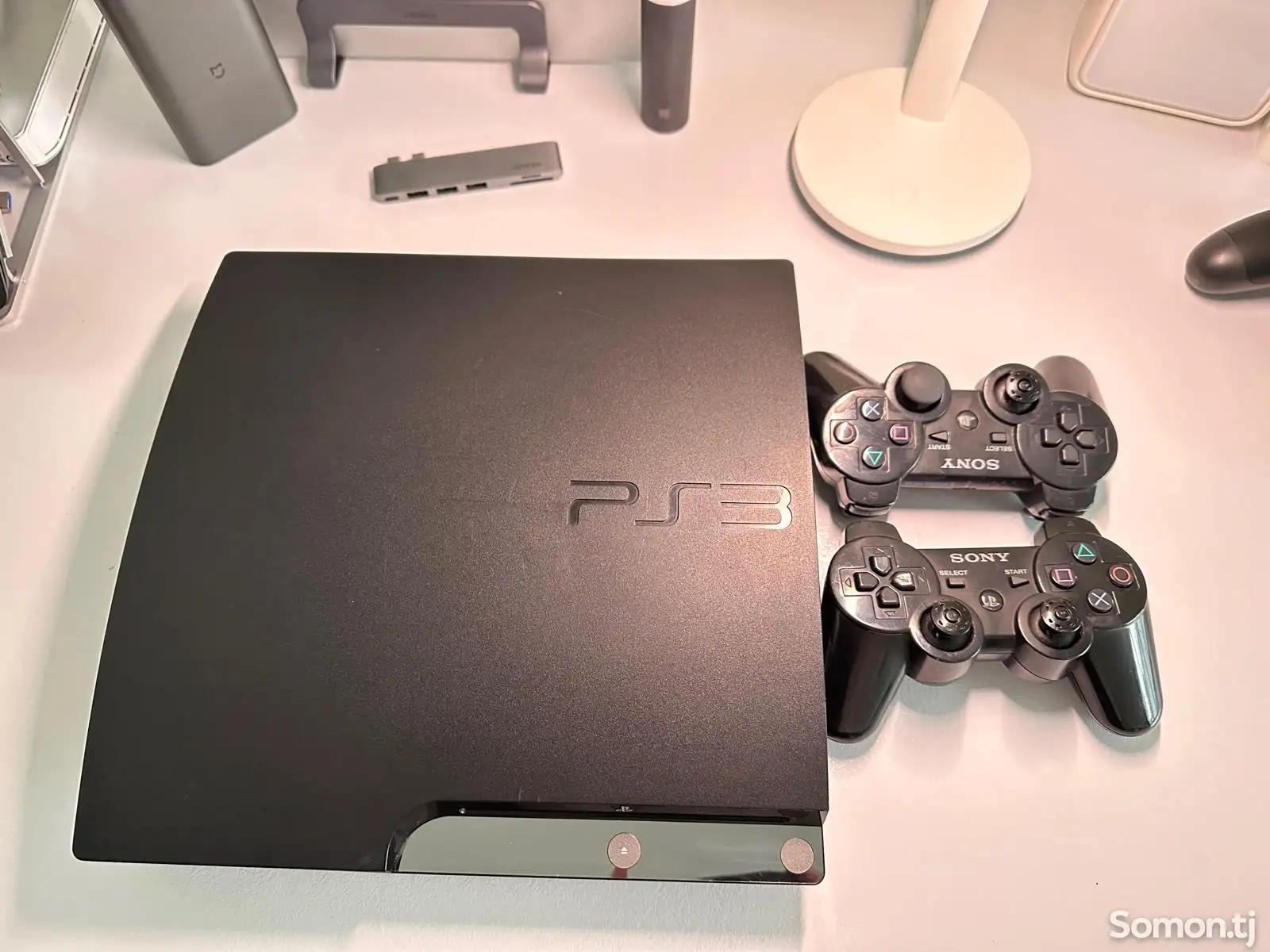 Игровая приставка Sony PlayStation 3 slim-1