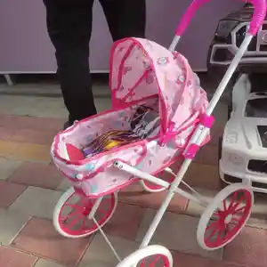 Детская игрушечная коляска