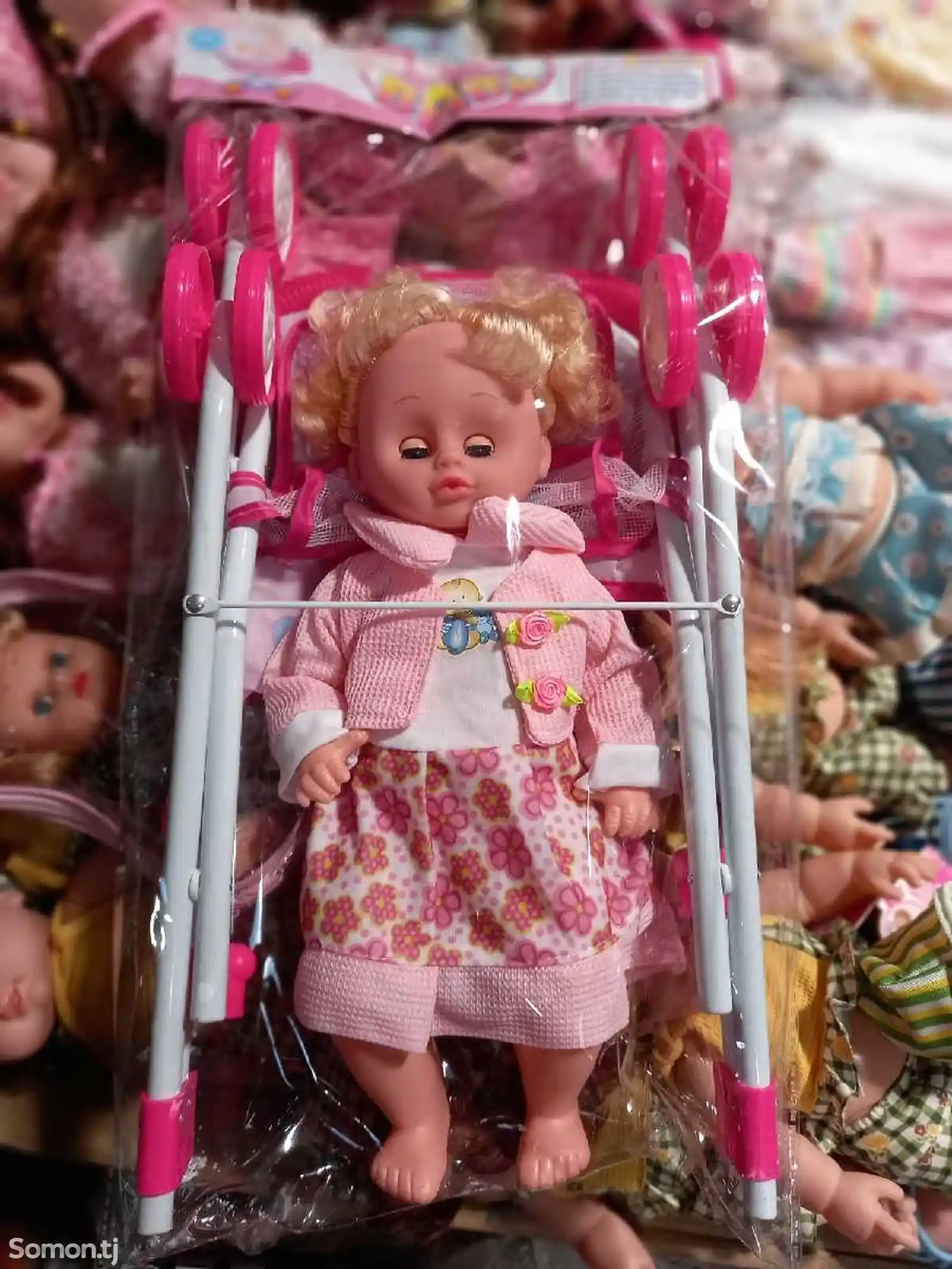 Кукла и коляска