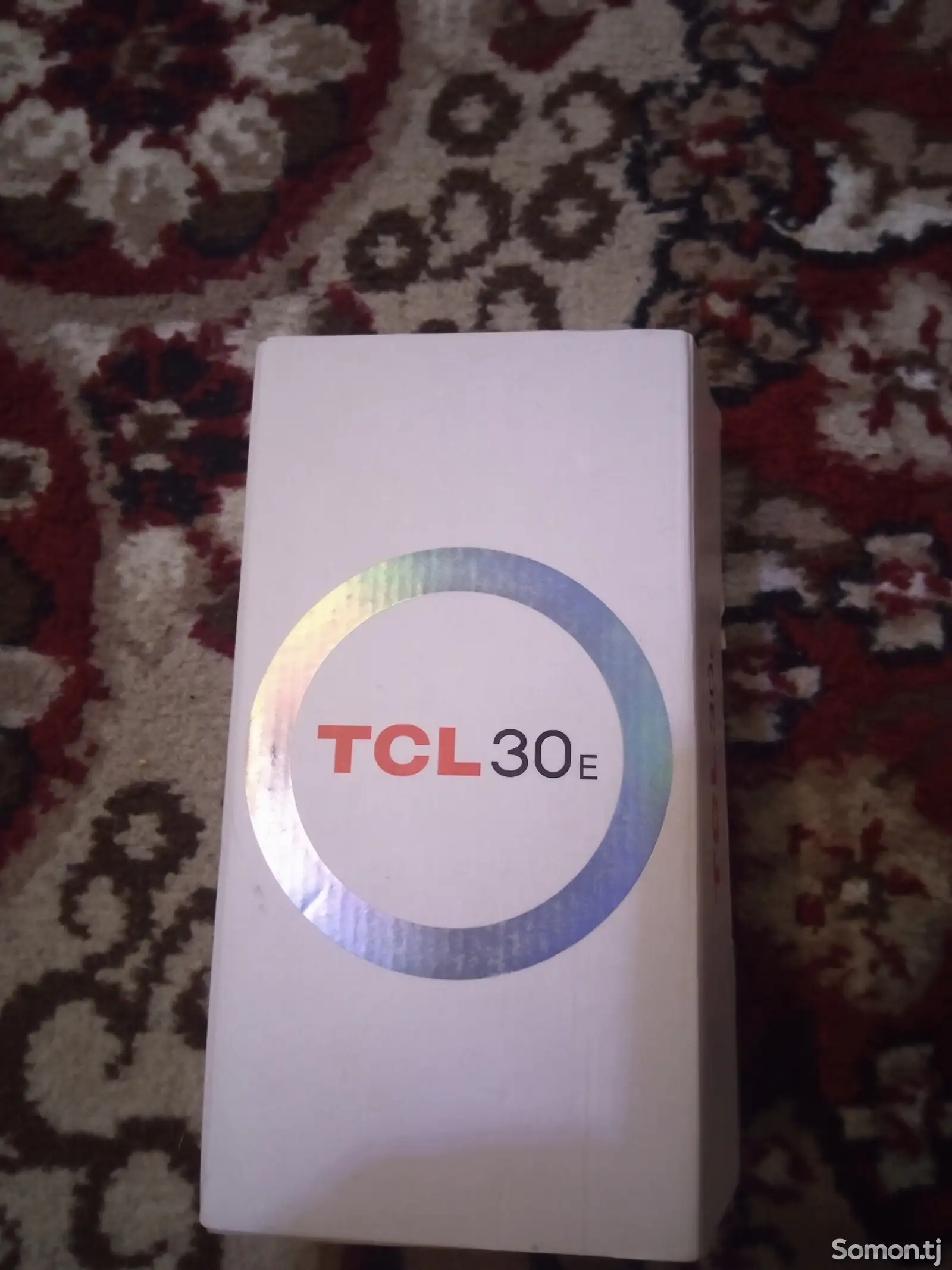 Телефон TCL-1