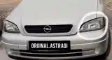 Фары на Opel Astra G-4