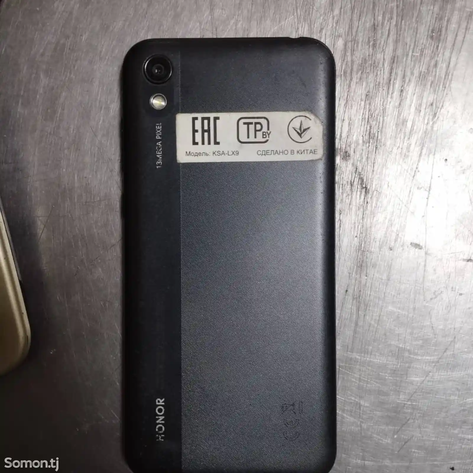 Телефон Huawei Honor-1
