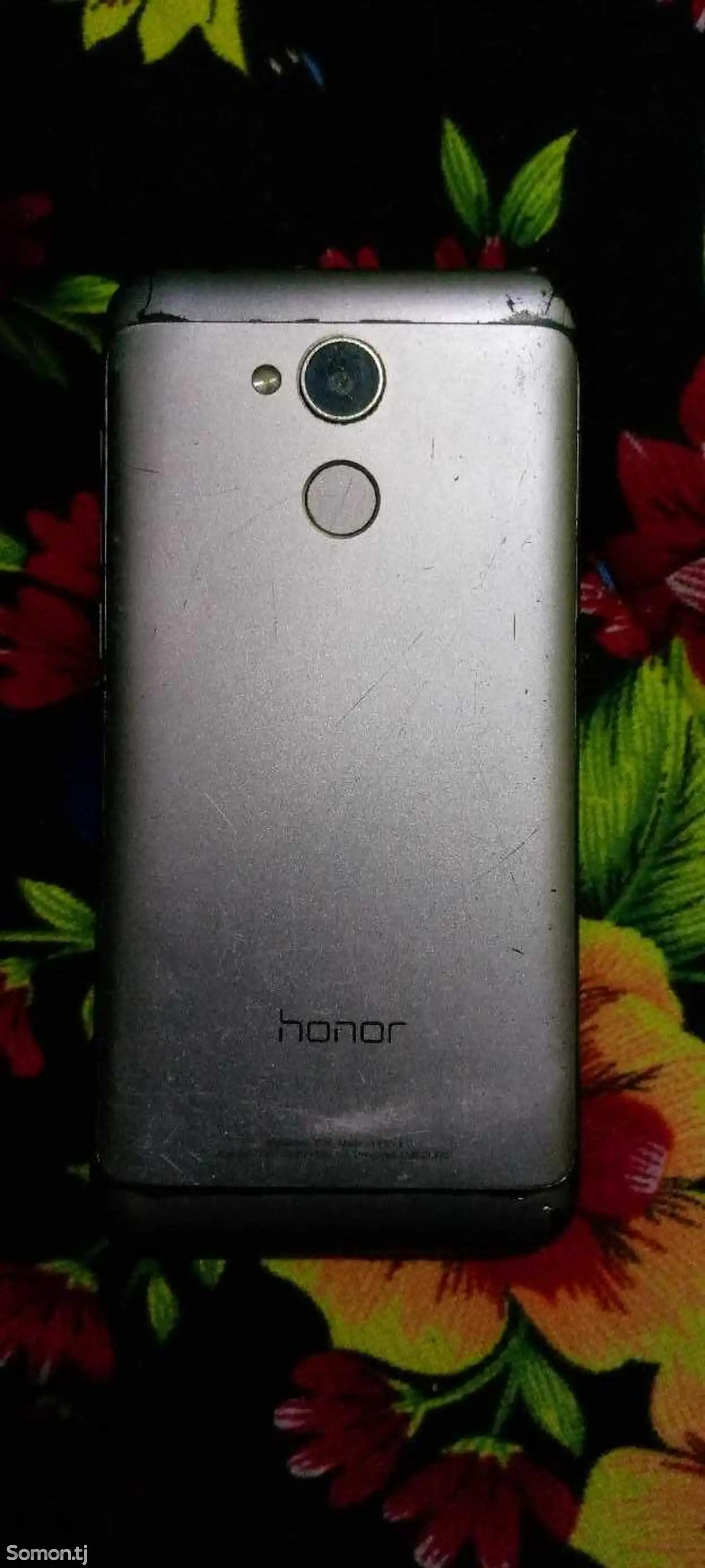 Телефон Honor-1