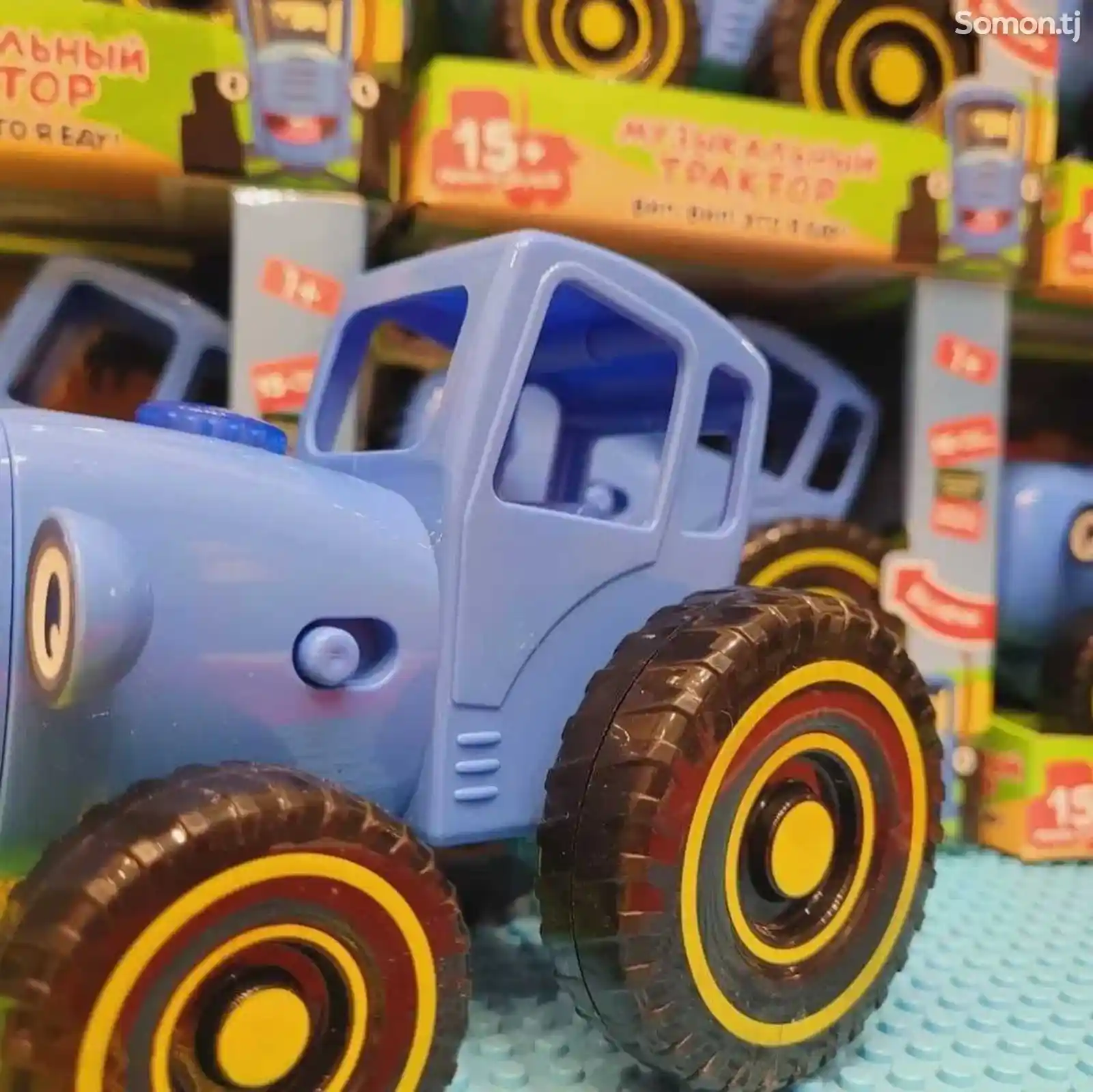 Синий трактор игрушка-5