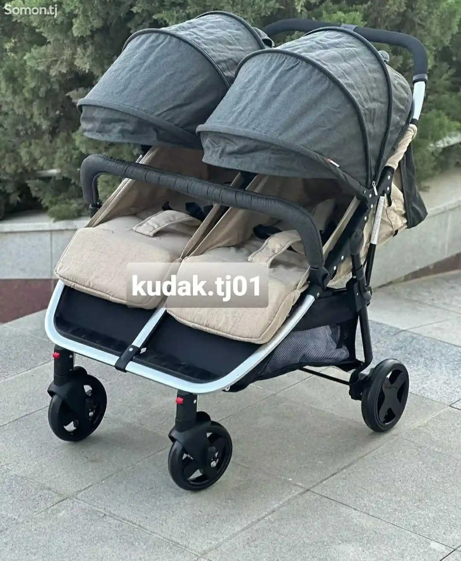 Детская коляска для двойняшек