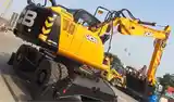 Колёсный экскаватор JCB 145W-10