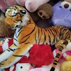 Тигр плюшевый