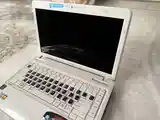 Белый ноутбук Toshiba-3