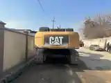 Экскаватор CAT-3