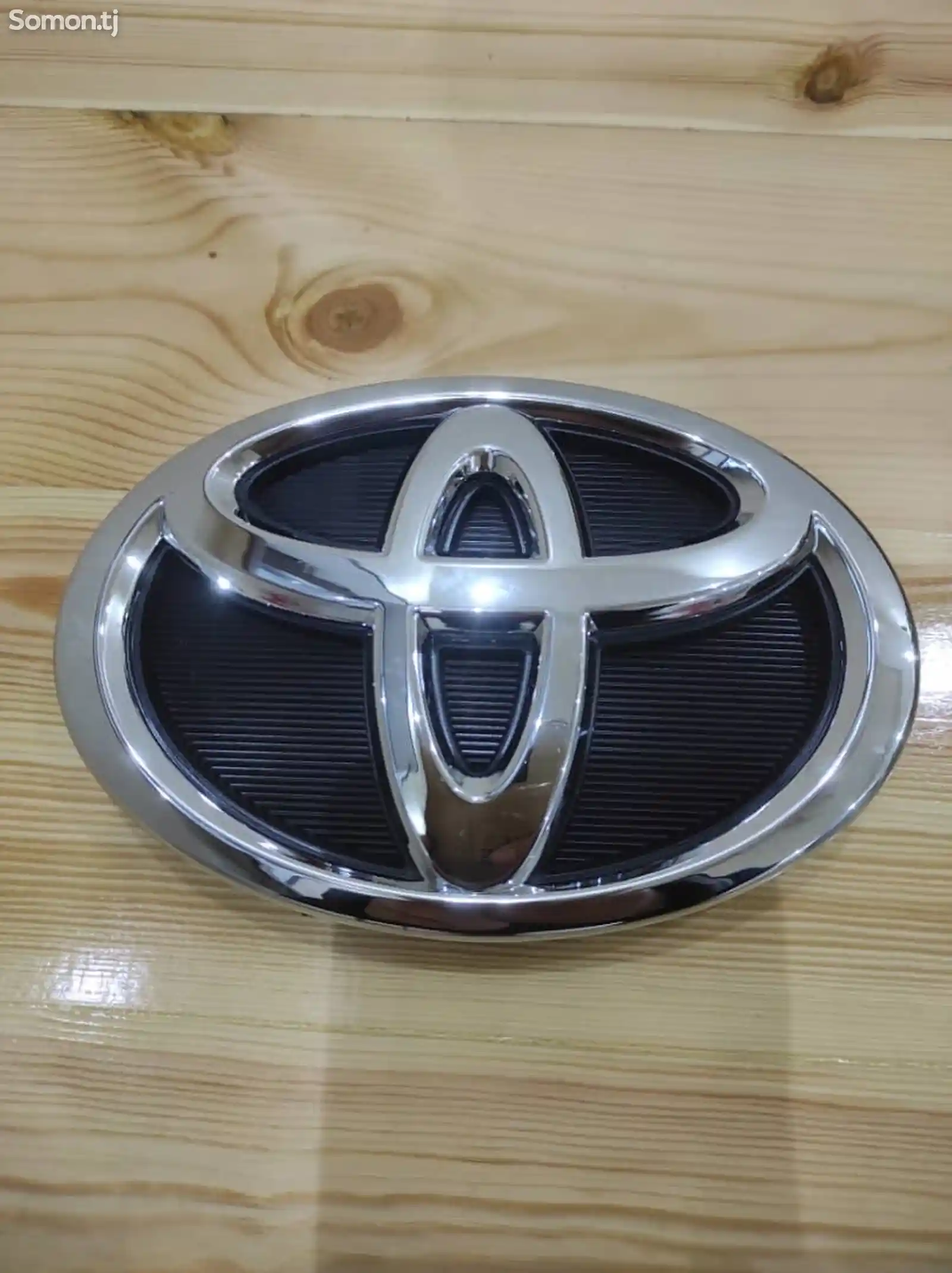 Знак от Toyota Camry 55-1
