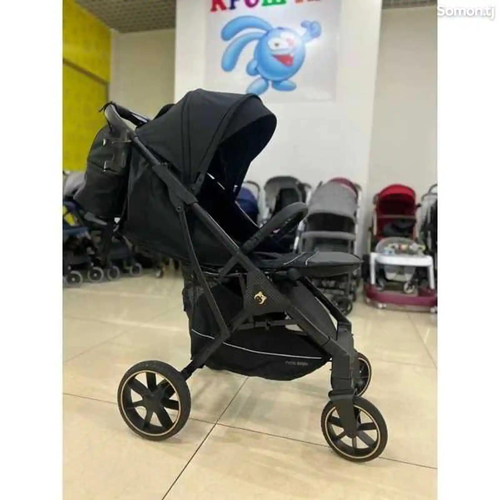 Проугулочная коляска ining baby-2