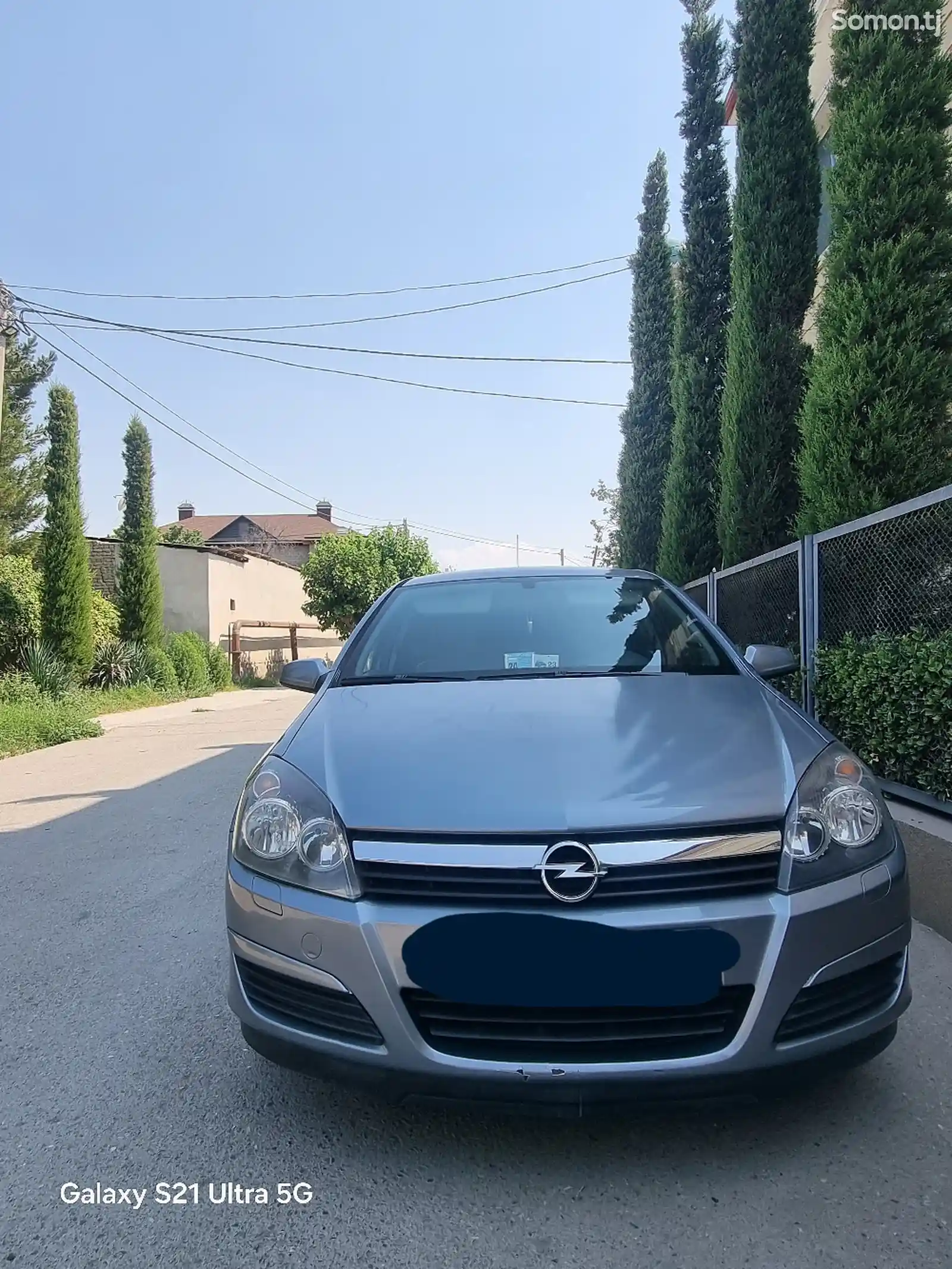 Передний бампер на Opel Astra H