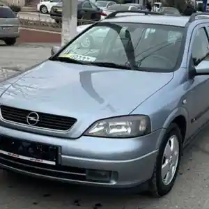 Лобовое стекло на Opel Astra G