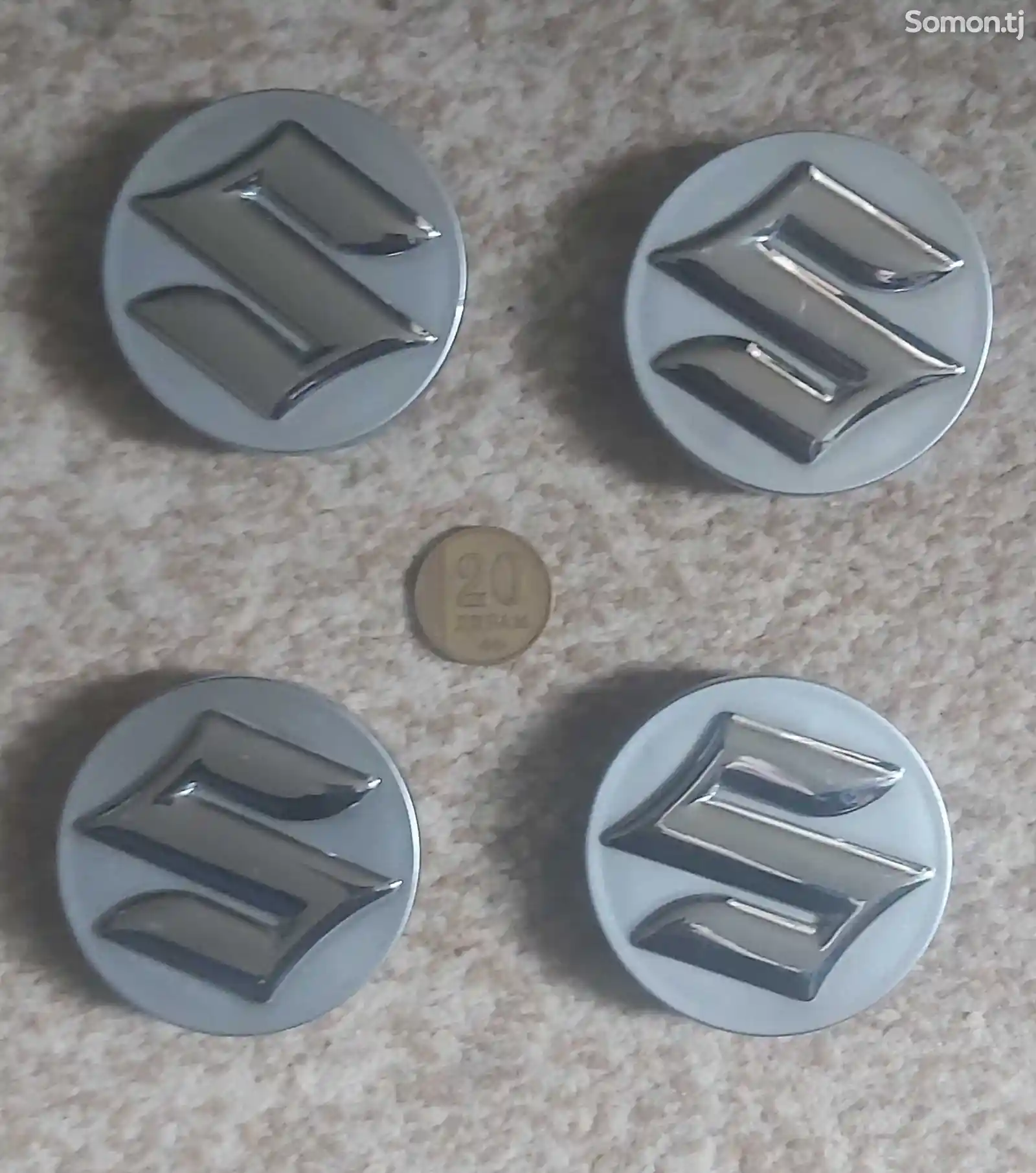 Колпачки для дисков от Suzuki-2