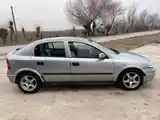 Opel Astra J, 2002-5