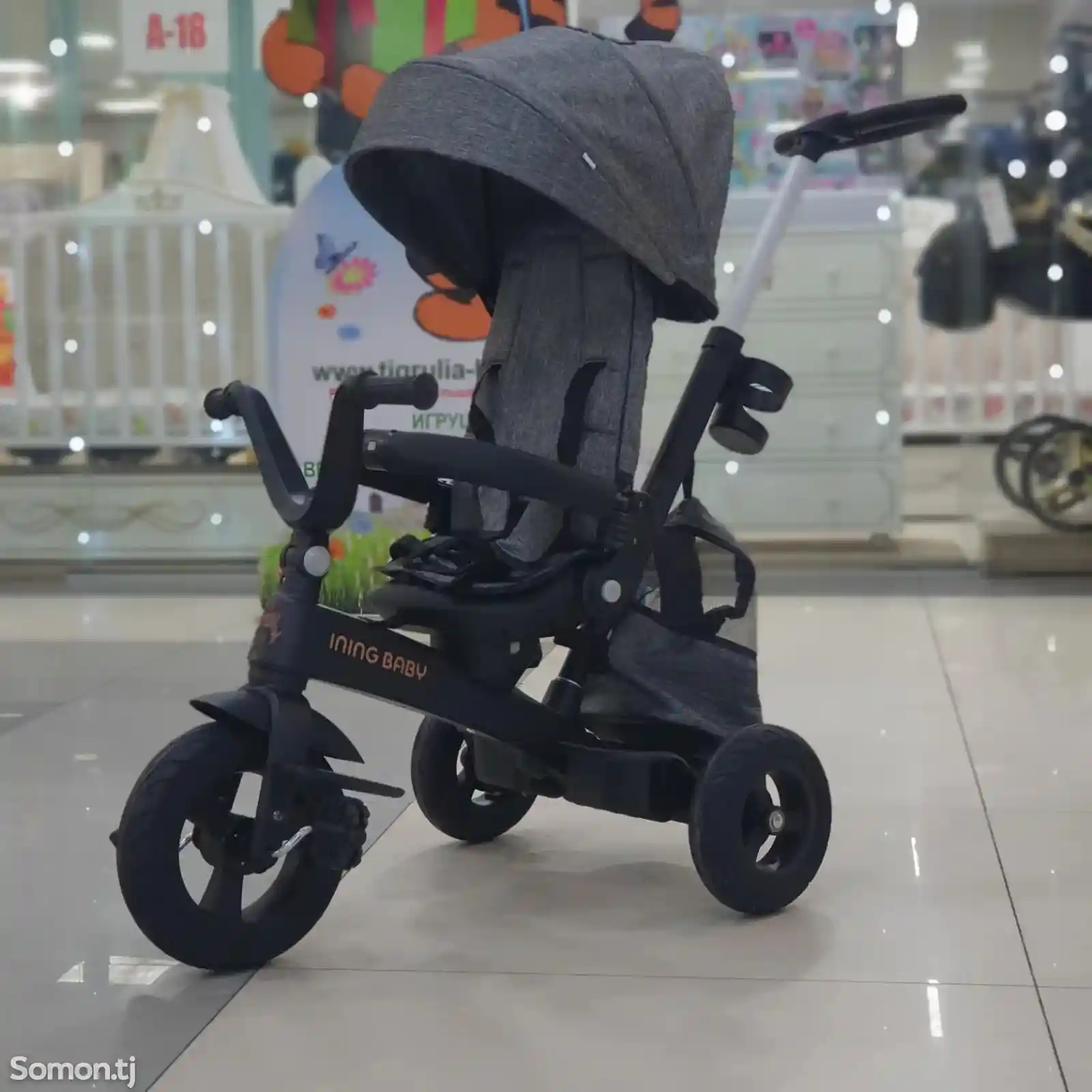 Детская трехколесная коляска-1