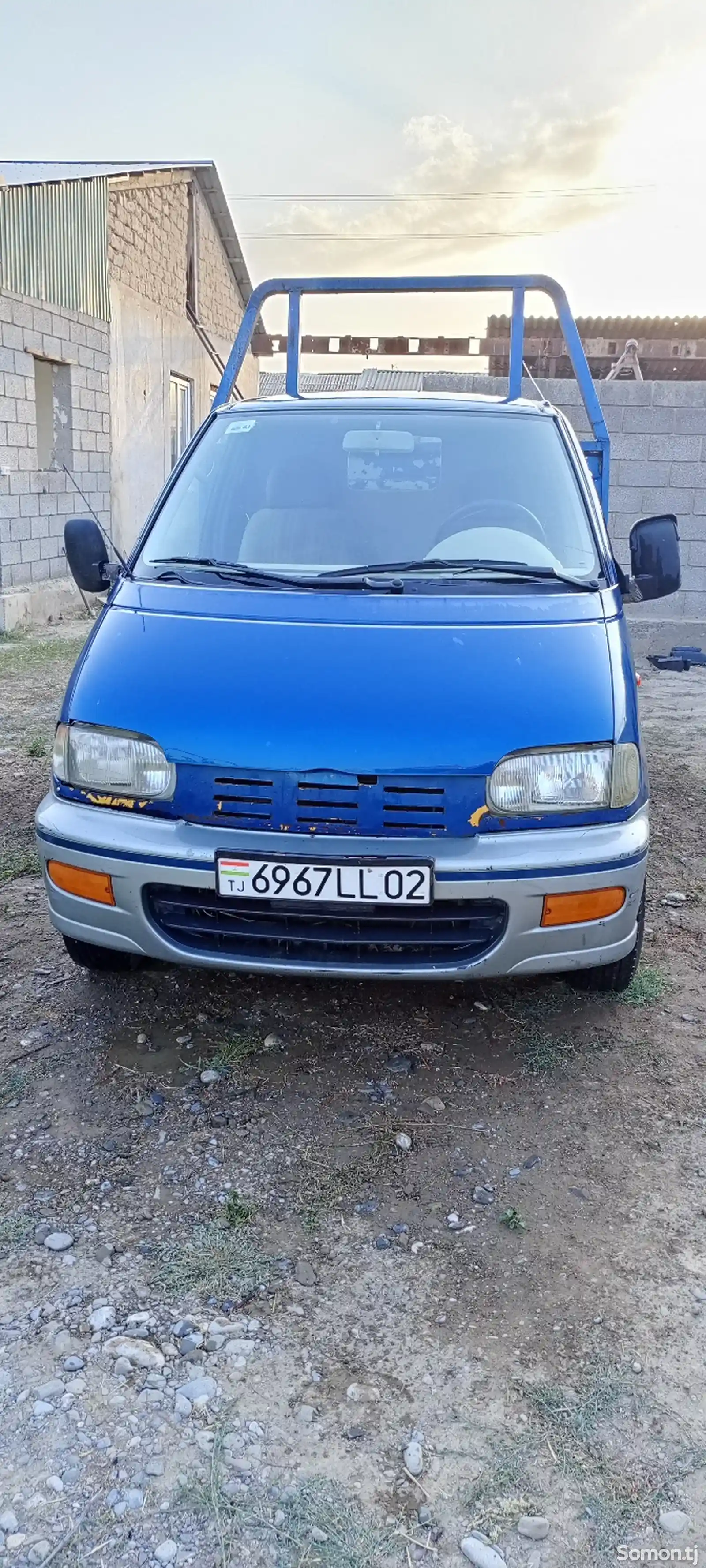 Бортовой автомобиль Nissan, 1996-2