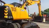 Колёсный экскаватор JCB 145W-9