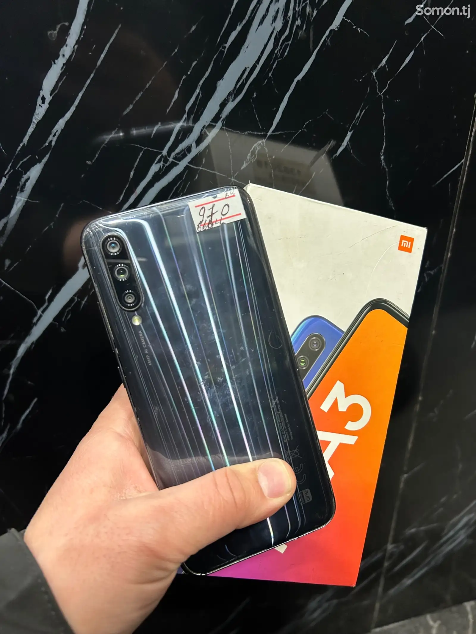 Телефон Xiaomi Mi