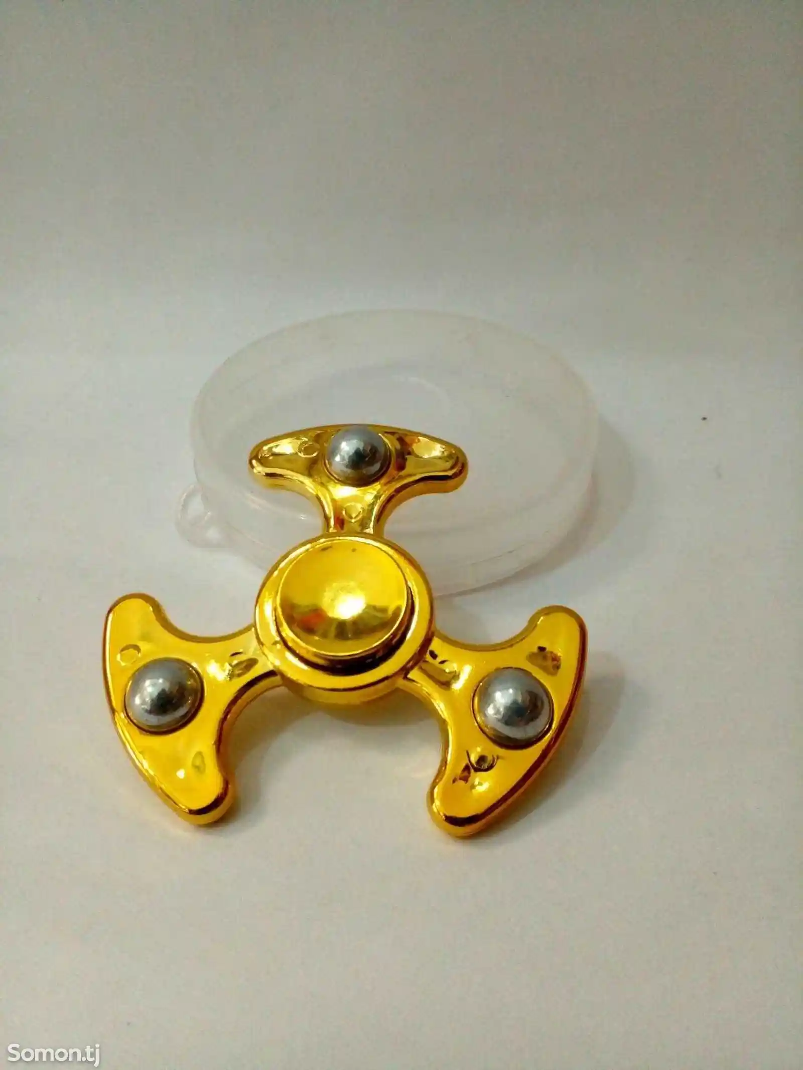 спинер железный золотистый тройка игрушка-1