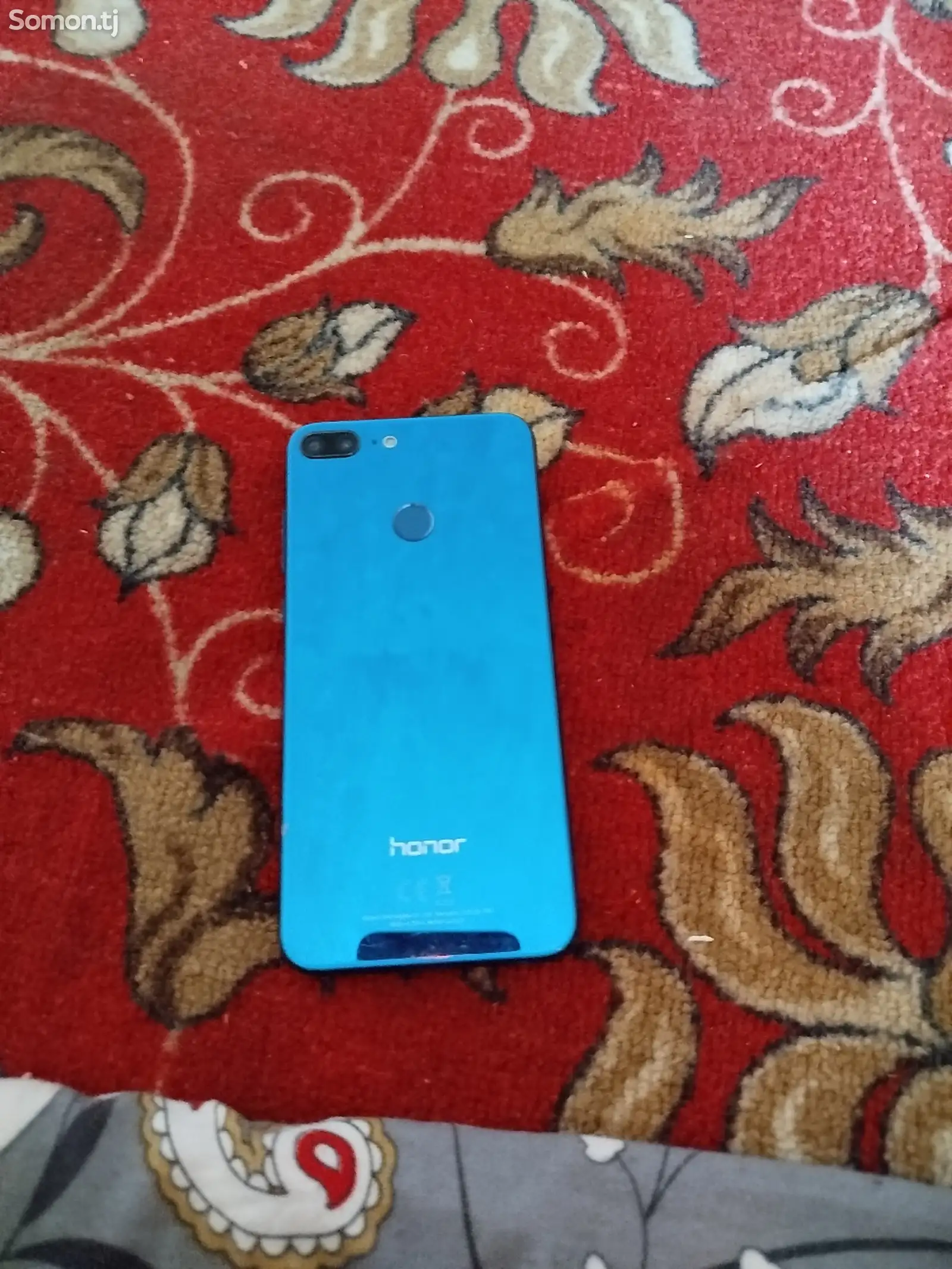 Телефон Honor-1