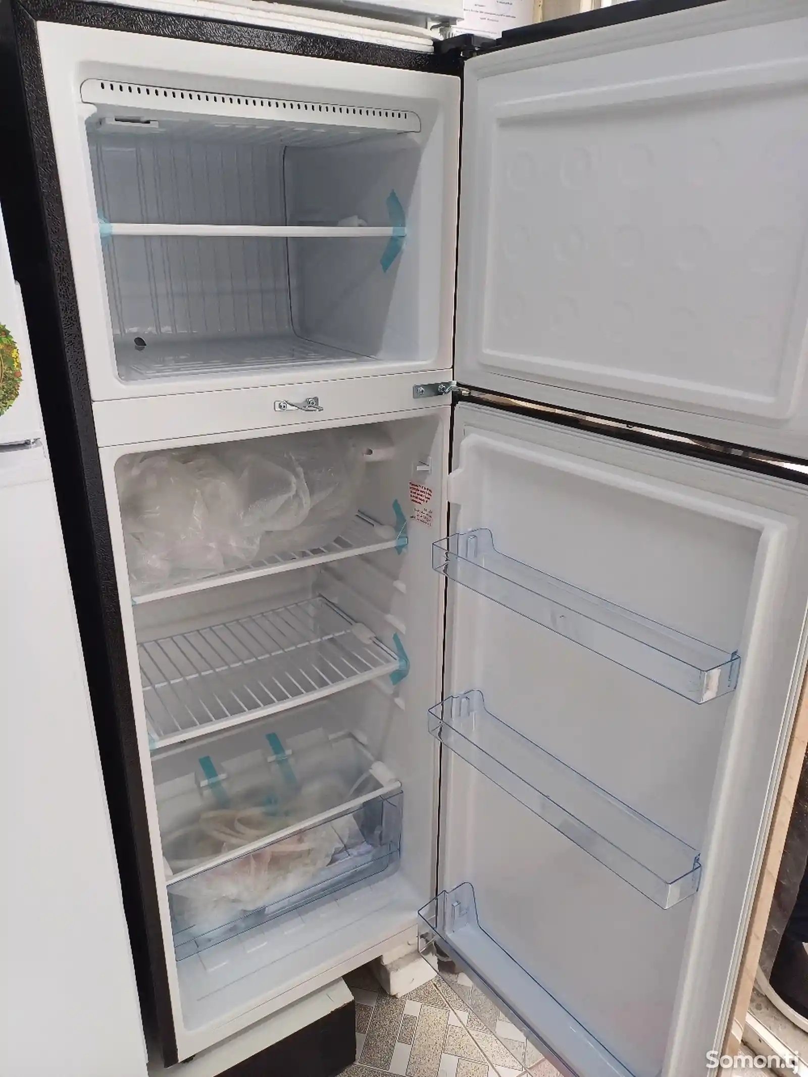Холодильник Tosan 210 L-3
