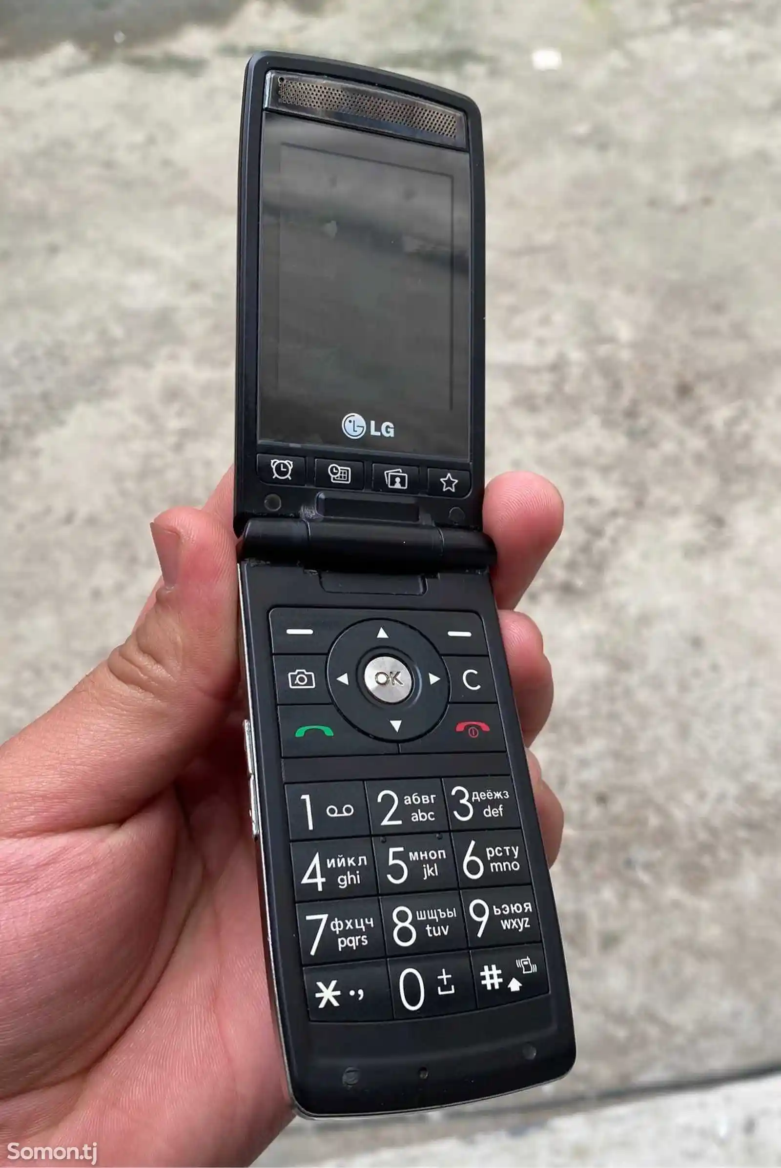 Телефон LG KF300-3